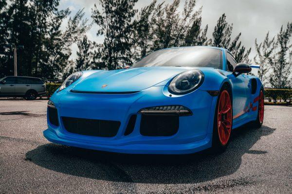 Porsche gt3rs full customization from full wrap, powder coated rims, custom decals, window tint  and more.