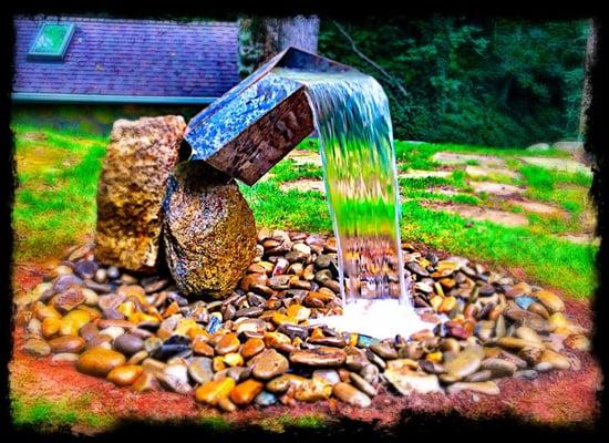 Custom fountain construction. Here is a modern style fountain in a natural background  Asheville nc