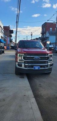 A diesel Ford F250 King Ranch. Front view.