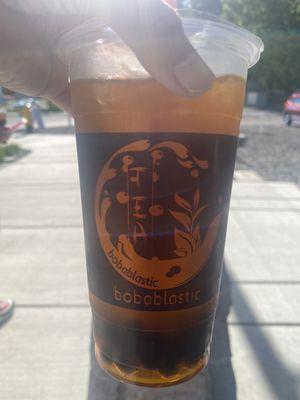 Peach black tea 70% sweet with boba. Really good!!