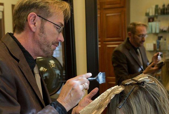 Daniel Savant at work in the Salon.