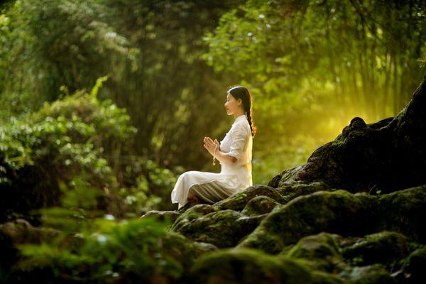 kundalini yoga and meditation student in Prayer Pose