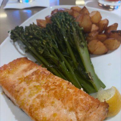 Seared salmon plate includes broccolini and Yukon potatoes