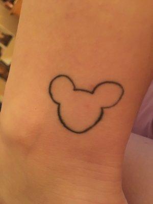 First tattoo came out very bad. The line is thicker on one part, and the face and the right ear are pointy. The whole thing is lopsided.