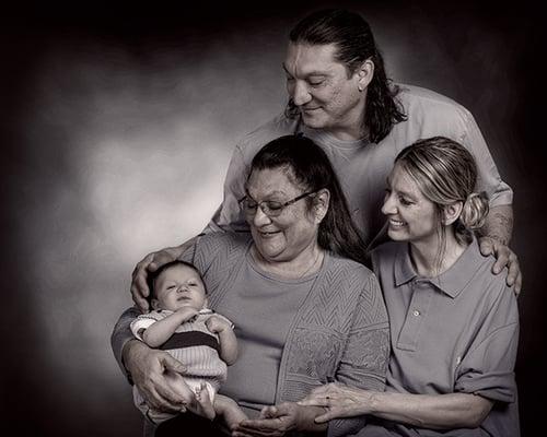 Studio session of a family group.