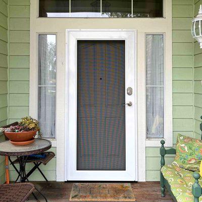 Professional security screen door installation for front door protection in Houston. Viewguard style pictured.