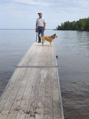 Fishing with dog.