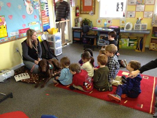 Threes' classroom getting a visit from a "community helper" as part of their curriculum.