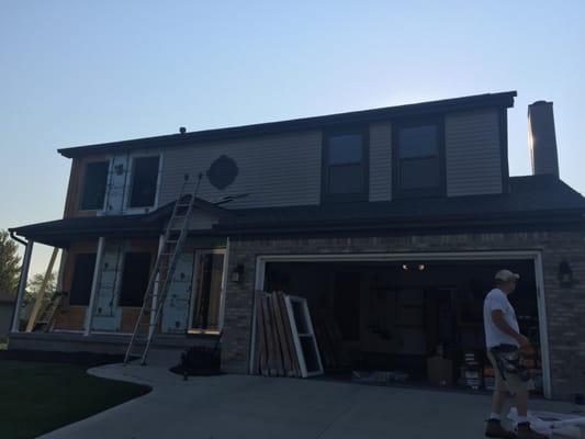 Before new siding, windows, and shutters.