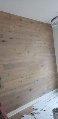 Wood flooring in wall installation.