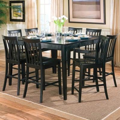 Furniture Plaza offers formal dining tables, kitchen tables, pub and counter height tables in almost every shape and finish.