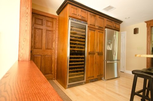 Another picture of a custom kitchen with wine rack done by Paul's Carpentry Workshop