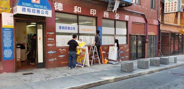 Decorating our windows.