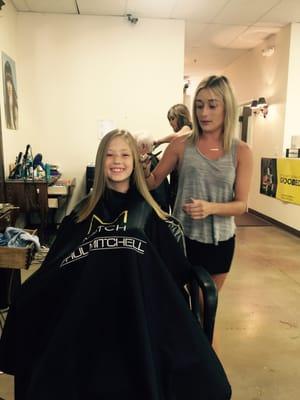 Final touches on Ella's long bob