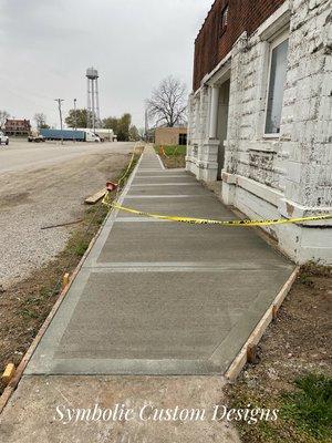 Concrete sidewalks for my childhood town's baptism church and Rec center