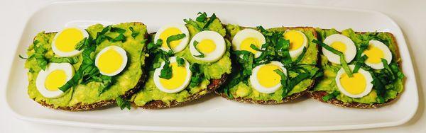 Breakfast avocado toast, hard boiled eggs garnished with fresh basil. we also cater for small and large groups.