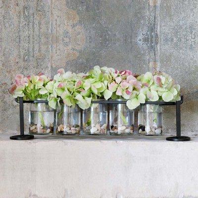 This versatile set of five recycled glass containers & metal stand can be used as a tabletop indoor garden or with candles as a wall sconce.