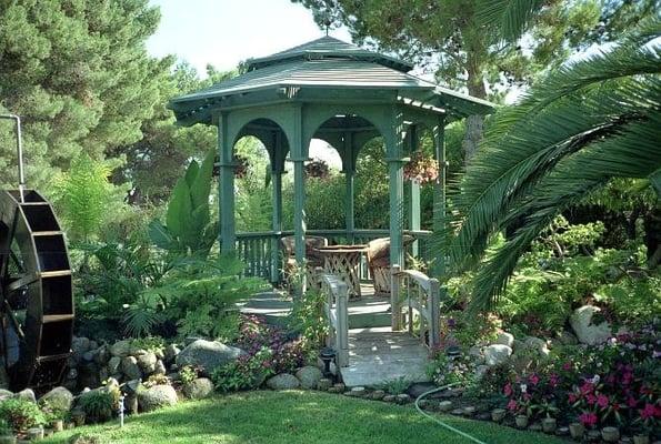 10-foot octagon gazebo with Victorian two-tiered roof and Orietal arched bridge