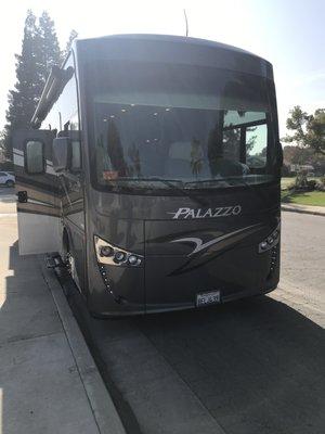 A beautiful new 35ft Thor Palazzo deisel RV with a smooth and comfortable ride.