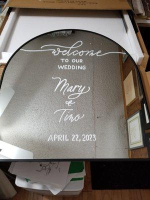 Welcome sign on customer supplied mirror.