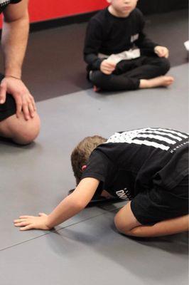 My youngest son receiving his belt