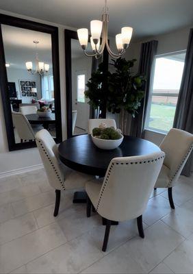 This home featured a small dinning area with large windows that let in beautiful sunlight