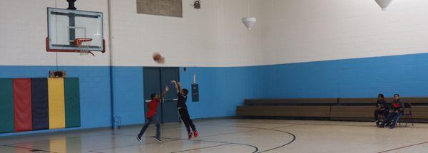 Two full size basketball courts.