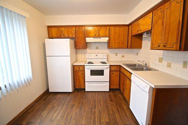 2 bedroom kitchen has fridge, stove, garbage disposal and dishwasher.