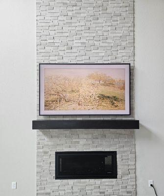 One of my favorite installs that we have done. This is a Samsung Frame, installed with a recessed media box behind it, and a custom bracket