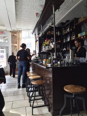 Cute bar and dining room. Super cozy - large windows,exposed brick, historic building