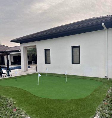 Landscaping, backyard paint job and a small golf course for the kids !