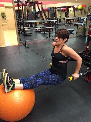 Stephanie in action doing some triceps dips to tighten and shape the back of the arms.