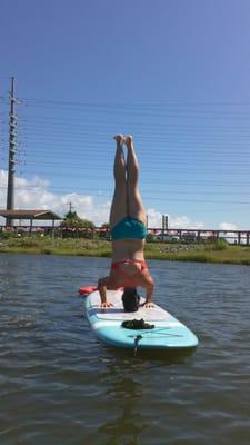 Sup Yoga classes, headstand (pic of Jennifer/owner/operator/instructor)