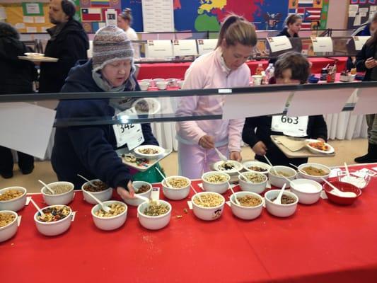 Worlds largest oatmeal topping bar at the Oatmeal Fest. 100+ toppings!