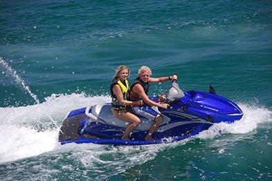 Couple riding their rented jet ski in Marathon FL