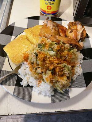 Fried cabbage and rice and cornbread and jerk chicken