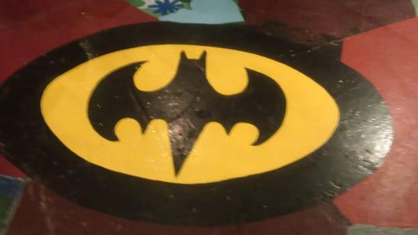 Shouldnt everyone have a life size Batman Emblem on their floor right beside the kitchen table? Thats what i was told,