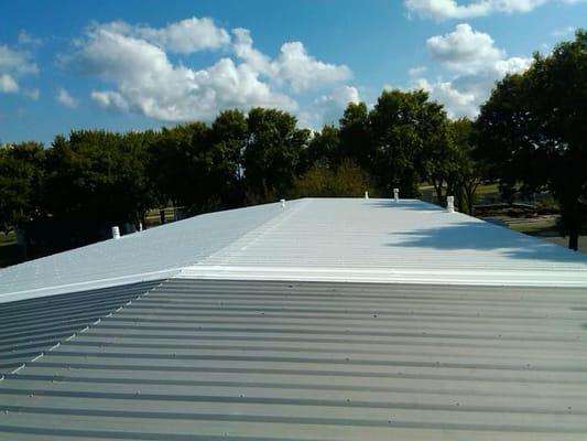 Puma XL coating. 15 year non-prorated warranty on materials and labor. Waterproof, seamless, highly reflective. yutzycommercialroofing.com