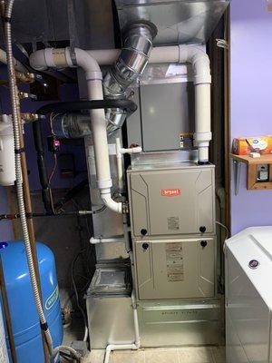 A furnace replacement with an added humidifier, 4" filter and air scrubber.