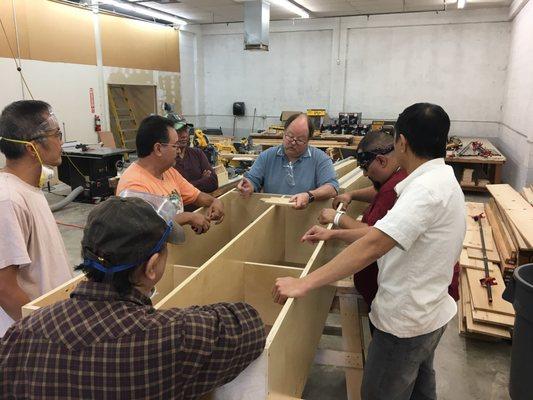 Images from our construction program.  Instructor Mr. Aston in the middle of a hands on lecture.