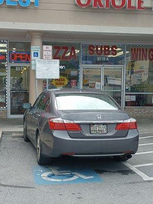 Employee taking a handicapped spot, yet is not handicapped!!!!