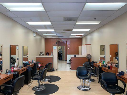 The salon stations where guests sit with stylists for their services.