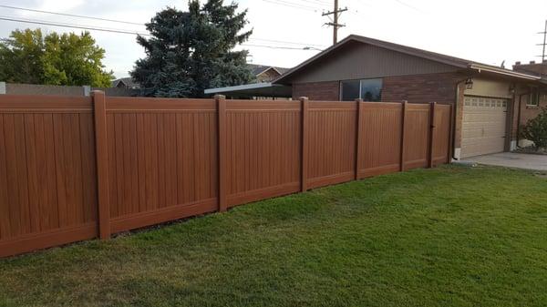 A Fence Utah. Mocha Walnut Vinyl Fence.