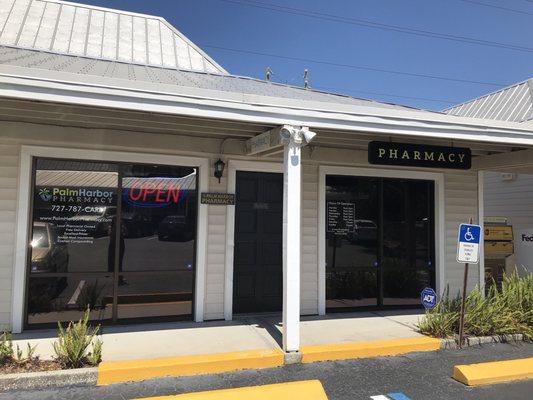 Pharmacy entrance, in the Oaklake Medical Center at Tampa Rd & US 19, behind Mobil