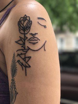 Minimalist line work piece by Ivan