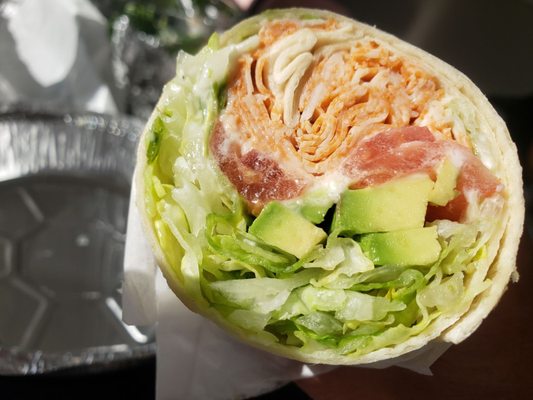 Buffalo Chix Avocado Wrap- Buffalo chix, avocado, lettuce, tomato, and ranch.