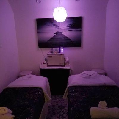 Cozy couple massage treatment room