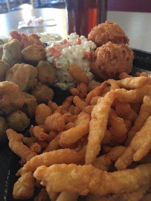 Holy Hell people. Clam strips. Fried okra. Hush Puppies. Slaw. I am in HEAVEN!