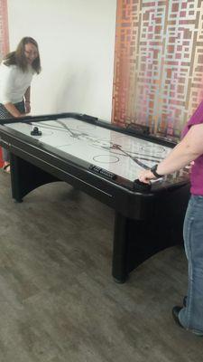 Air hockey in lounge area of cafeteria