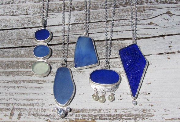 Custom sterling silver and sea glass jewelry is made at SwellColors! Bring in your beach finds and we can make you something special.